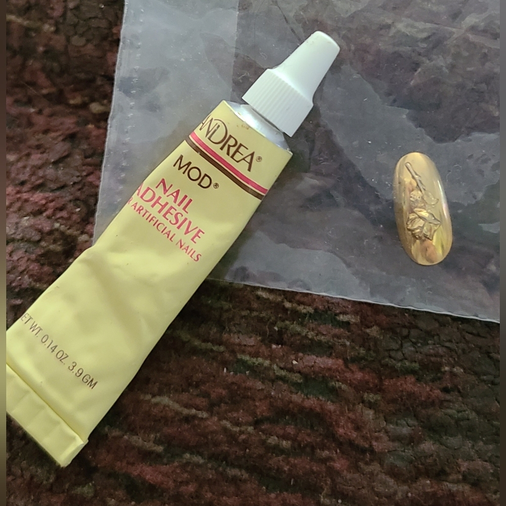 NEW Gold Plated Rose Nail And Nail Glue.